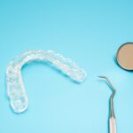 Dentist material to treat bruxism with dental splints, isolating on medical background